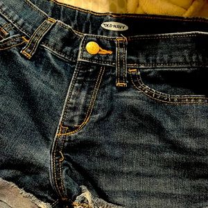 Old navy blue jeans bought and wore once